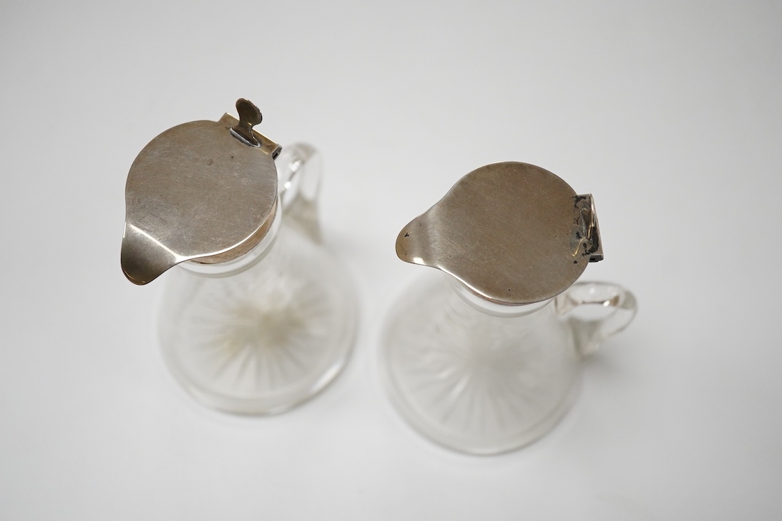 A pair of Edwardian silver mounted glass whisky noggins, by J & J Maxfield Ltd, Birmingham, 1906, height 10.6cm.